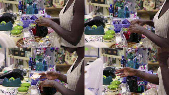 无法识别的女性顾客黑人种族用欧元钞票在商店购买