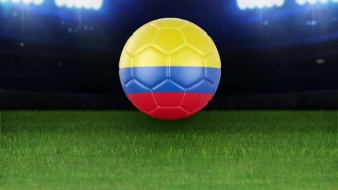 哥伦比亚国旗足球，带灯跳入体育场。足球场和球，4k分辨率，循环-股票视频