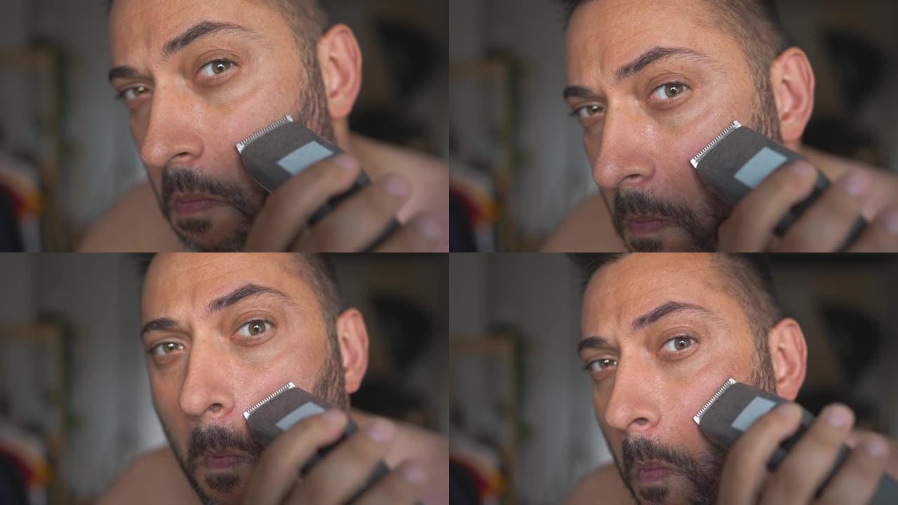 现代男性专注而创造胡子线以上的眼睛