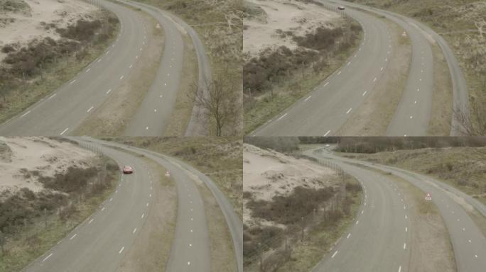 在荷兰的道路上行驶的法拉利308 gti的鸟瞰图。