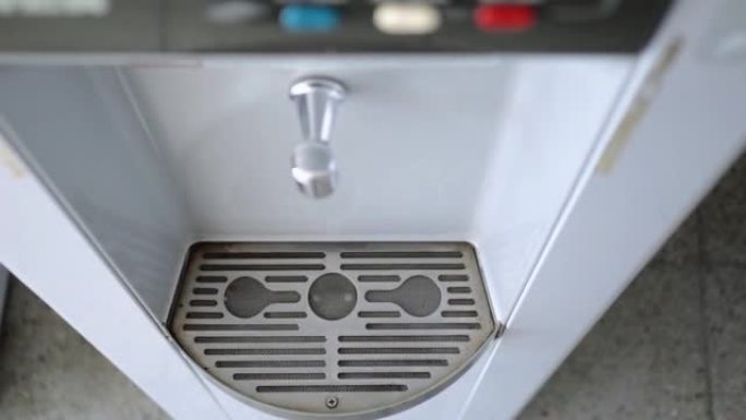 Water dispenser in public places. The focus is on 