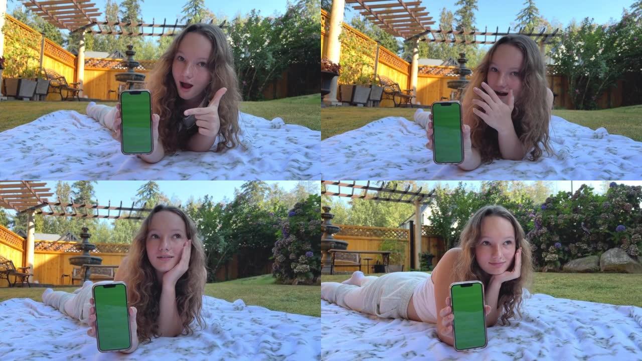 一个穿着一身运动白色衣服的少女看着画面，微笑着展示了一个绿色屏幕的手机，你可以在上面放置社交网络或其
