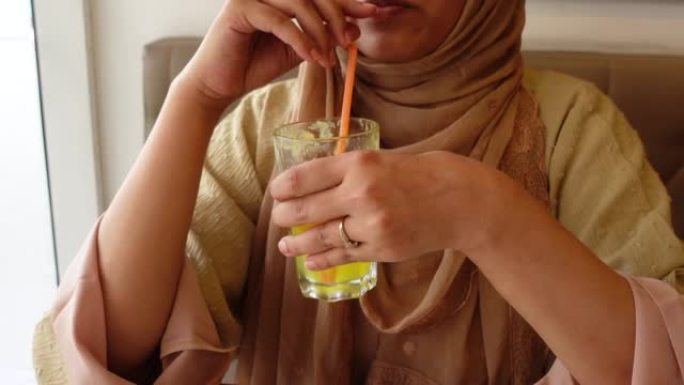 young women drinking banana milk shake at cafe