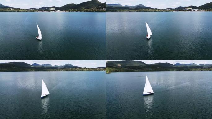 一个大湖上有白帆的帆船。大风条件下帆船的鸟瞰图
