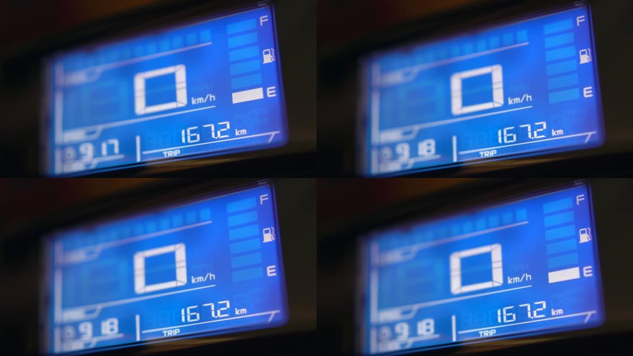 4k镜头蓝色数字仪表显示低燃油警告。