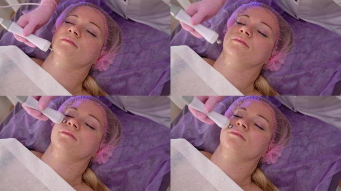 微电流疗法。美容师美容护肤程序。