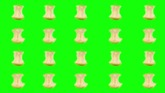 行，被咬掉的成熟黄色苹果的许多存根在绿色色度键背景上旋转。简约动画设计风格。元素概念空白背景模板。最