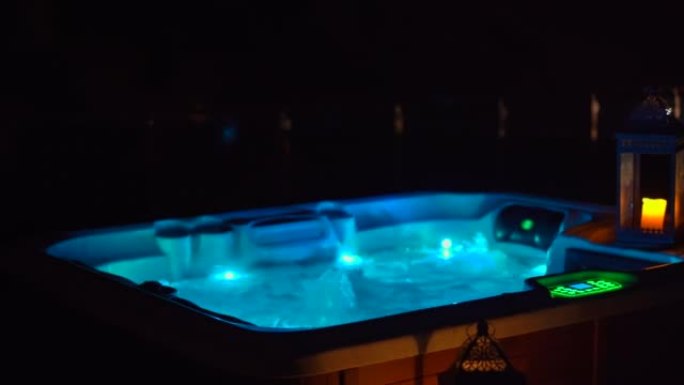 Night scene. A hot tub on a rooftop at night with 