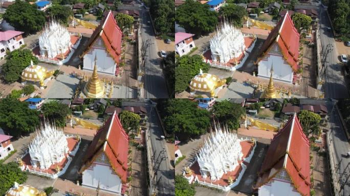 鸟瞰华丽的佛南寺塔尖，这是泰国法莱的一座泰式寺庙。泰语翻译:“幸福，幸运，健康”