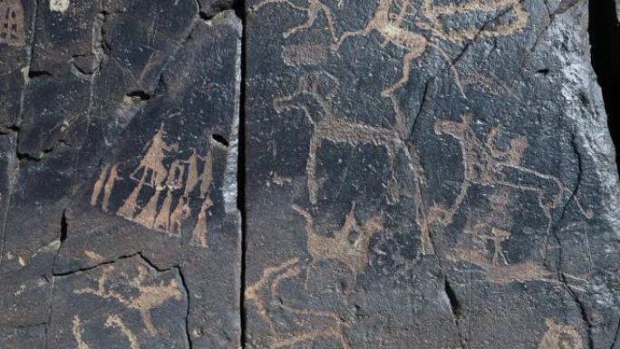 在蒙古南部戈壁沙漠地区发现的古老的khavts步态岩画可以追溯到8000年前