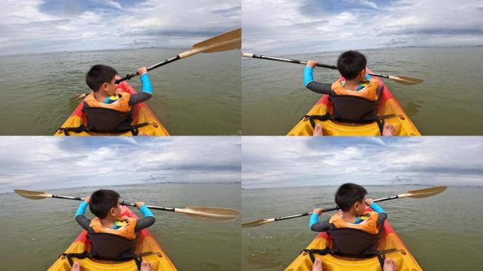 泰国芭堤雅的亚洲男孩划船独木舟