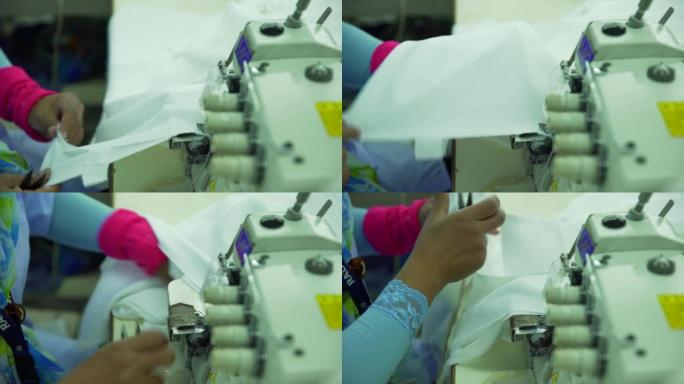 服装制造厂妇女缝纫布