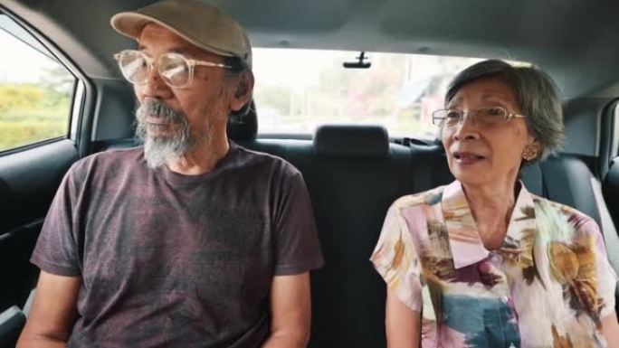 Senior retirement Asian in car or taxi