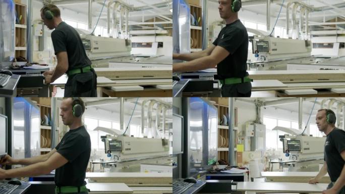 木匠在车间用一台特殊的机器工作