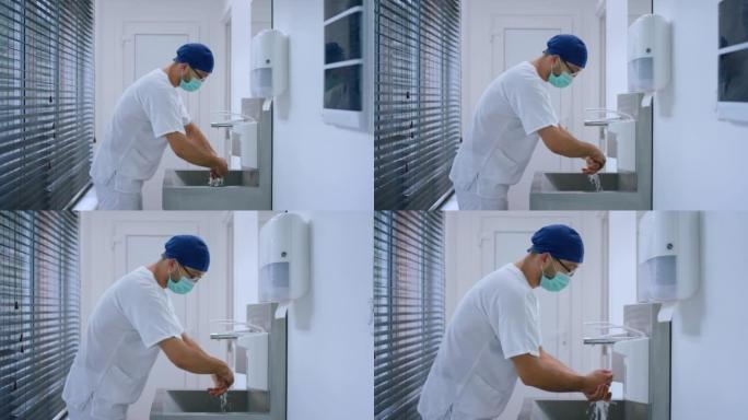 在现代医院的手术室里，在摄像机前医生外科医生开始手术之前，洗手得很好，并穿着医用制服和防护口罩