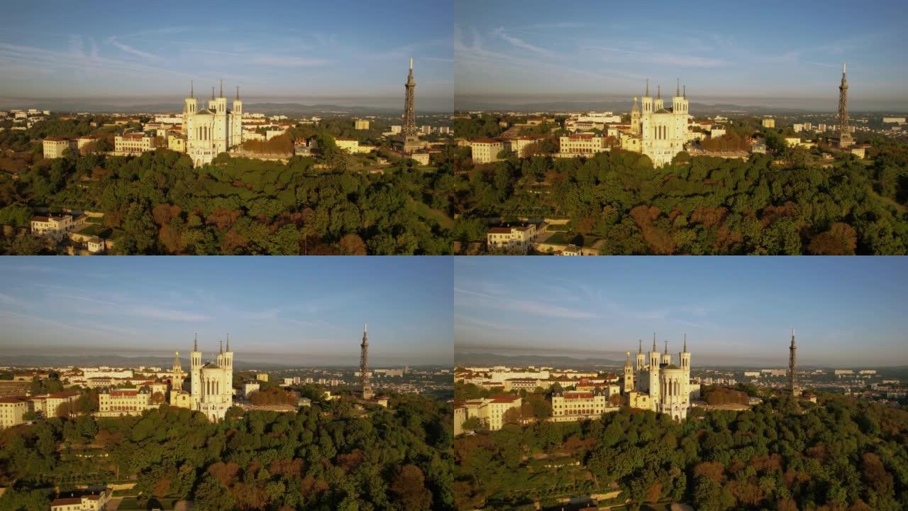 在法国里昂的巴黎圣母院和金属塔周围旋转的无人机航拍画面。