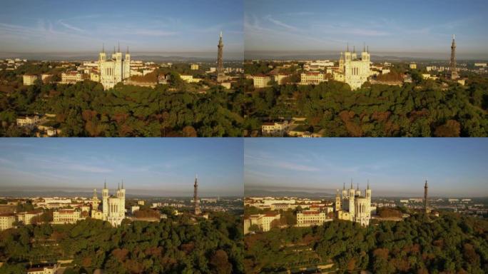 在法国里昂的巴黎圣母院和金属塔周围旋转的无人机航拍画面。