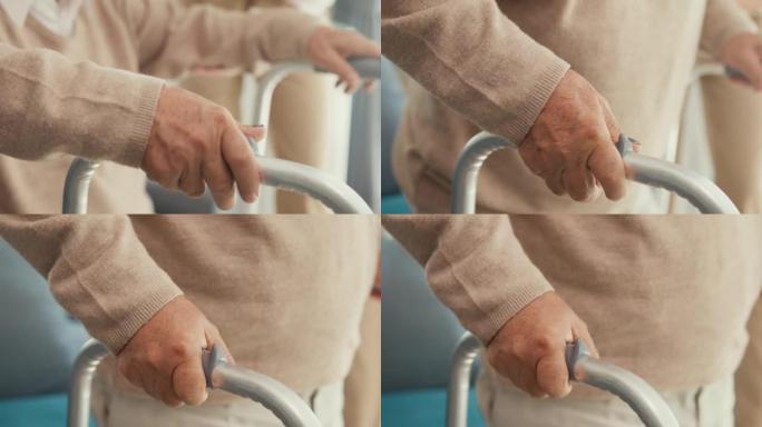 特写年轻的亚洲女性照顾者教老男性走路使用助行器照顾牵手老年患者在家。