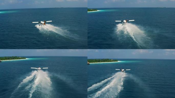 马尔代夫: 2022年1月20日。水上飞机或水上飞机正在水上起飞或降落。马尔代夫航空公司抵达，TMA