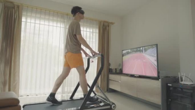 东南亚男子使用VR玻璃技术练习跑步