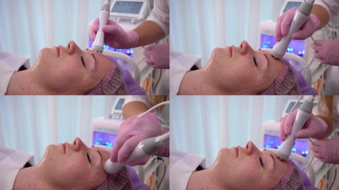 微电流疗法。美容师美容护肤程序。