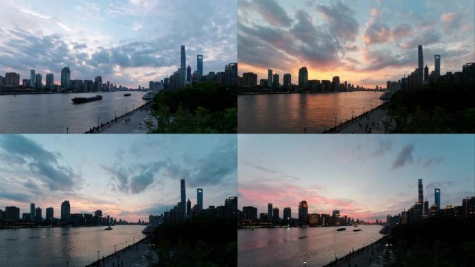 美丽的上海城市景观从日落到夜晚，灯光打开，货船在黄浦江上航行，4k镜头高角度视图，延时视频，b滚动镜