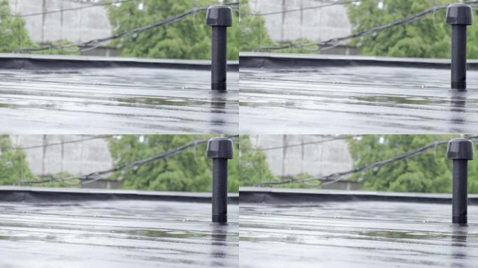 雨滴敲屋顶，大雨，倾盆大雨。建筑物的平屋顶覆盖有防水材料，可防止雨淋。Ruberoid，轧制屋面和防