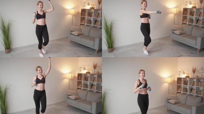 家庭健身室内运动女子哑铃训练