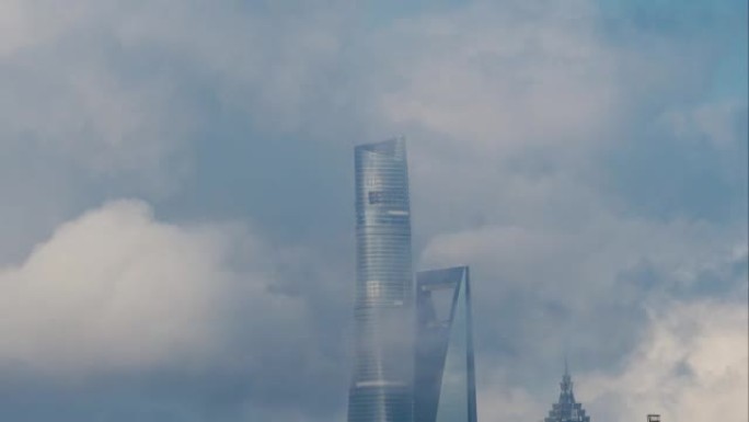上海中心和上海环球金融中心，早晨有移动的白云背景，4k延时镜头。