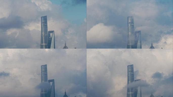 上海中心和上海环球金融中心，早晨有移动的白云背景，4k延时镜头。