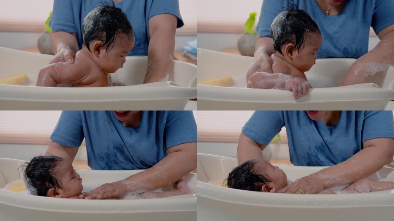 4K，亚洲继母，站着给刚出生的女儿洗澡，大热天，为了让女儿感到舒服，一位母亲把女儿放在浴缸里揉搓，清