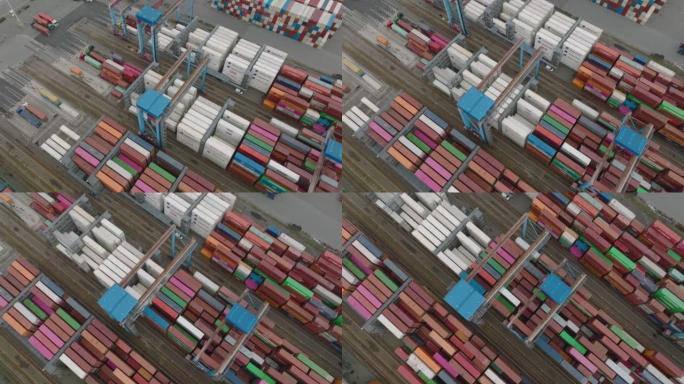 大型门式集装箱起重机越过较小的。港口货物运输码头的工作。多式联运和全球物流。德国汉堡
