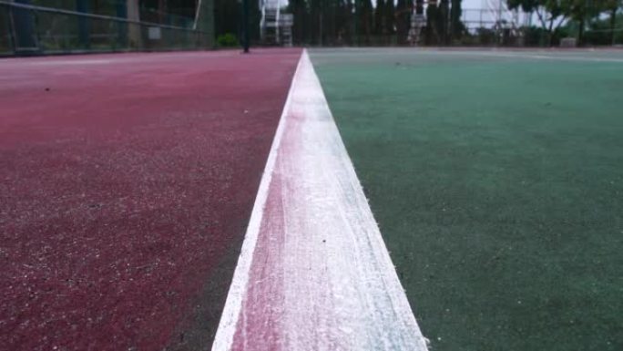 镜头慢动作: 网球击中地面