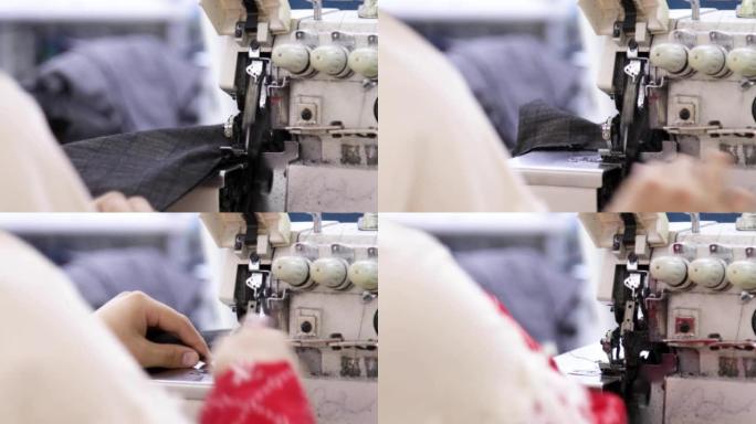 裁缝在电动缝纫机上工作