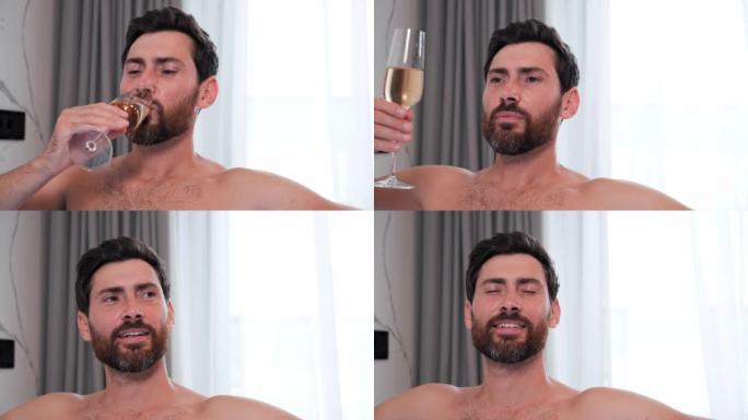 喝完香槟后，满意的快乐性感商人在酒店享受水疗。帅哥在浴缸里放松的肖像。室内水力按摩有魅力的男人。