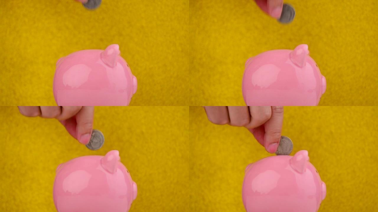 存钱存钱罐粉红猪孤立金色背景