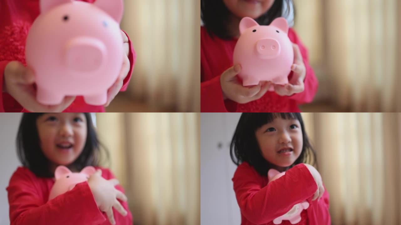 4K Video slow motion asian kid put coin into piggy