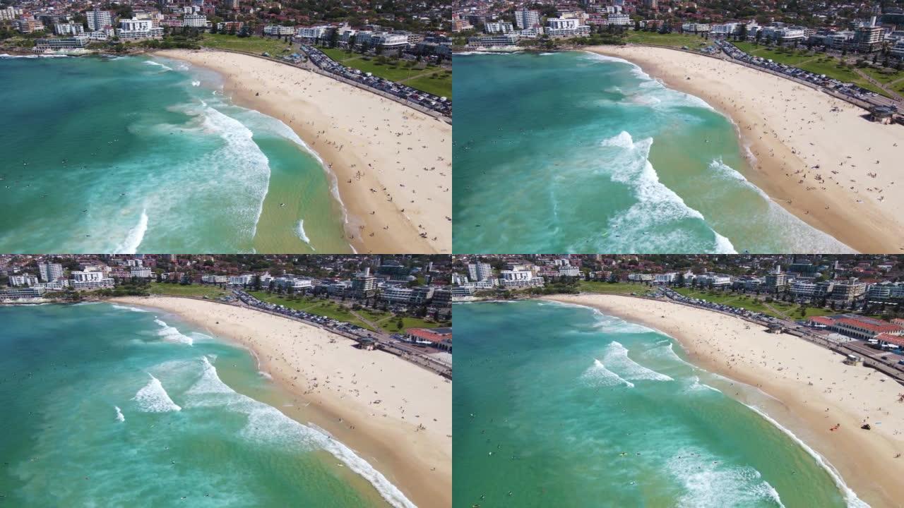 2022年春季晴天，新南威尔士州悉尼标志性邦迪海滩的空中无人机回撤