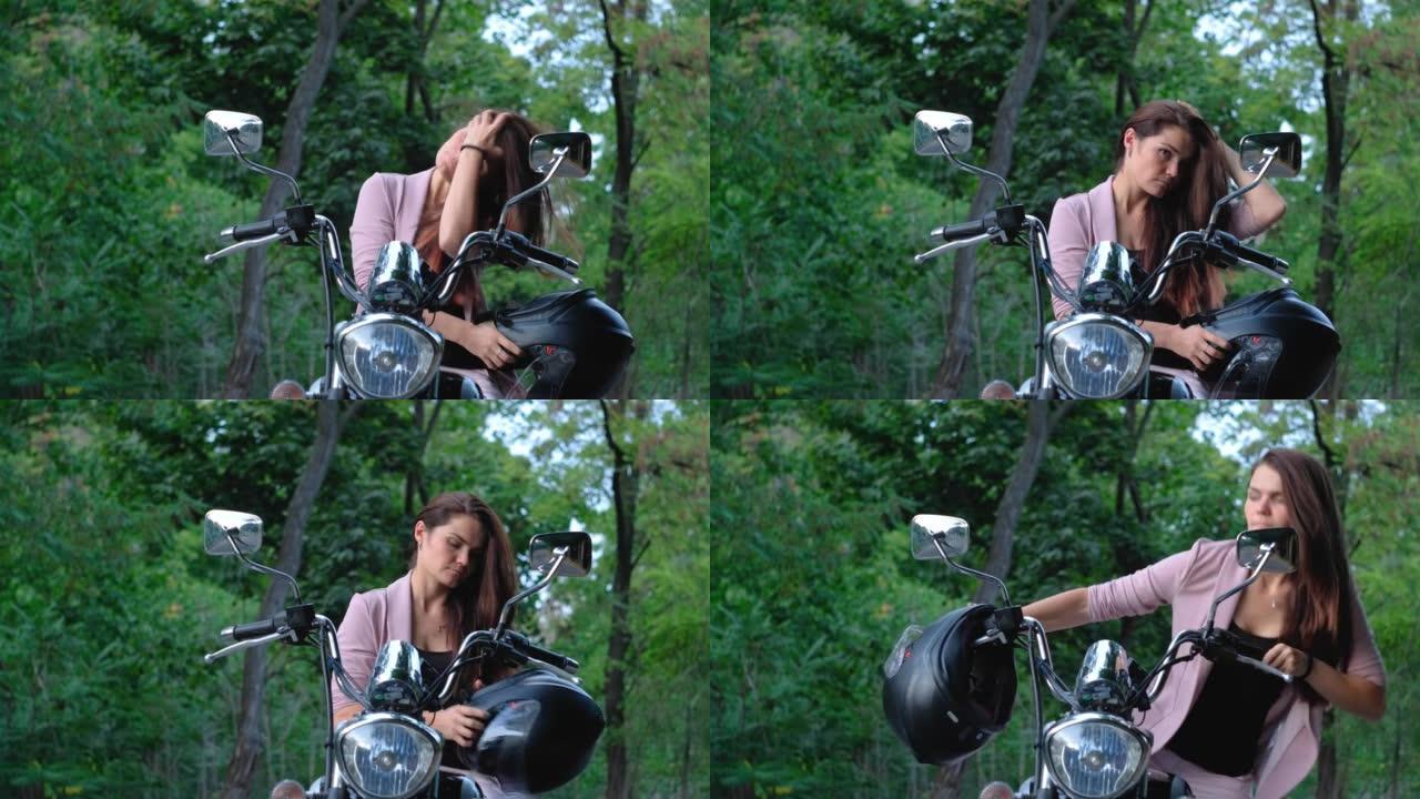 骑摩托车的美女脱下头盔照镜子