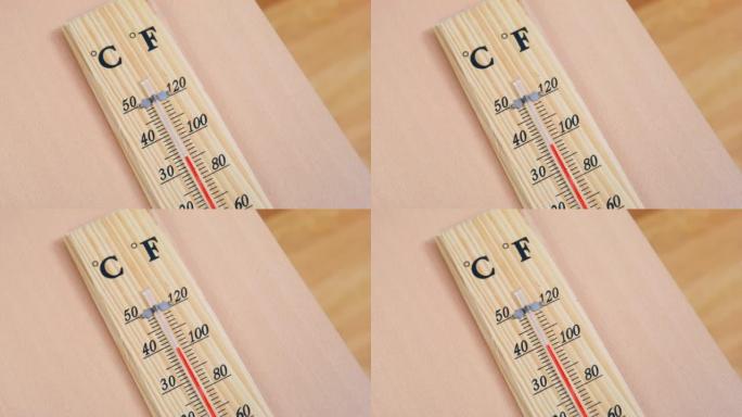木制温度计上的温度指示器迅速上升