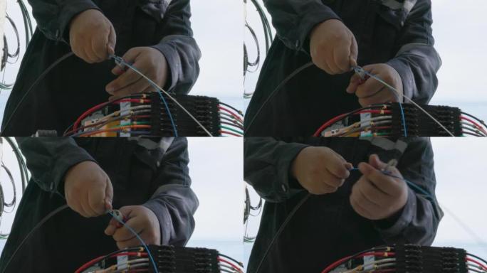 光纤电缆互联网信号拼接和电线连接设备的融合，光线焊接机光纤焊接ISP工程师
