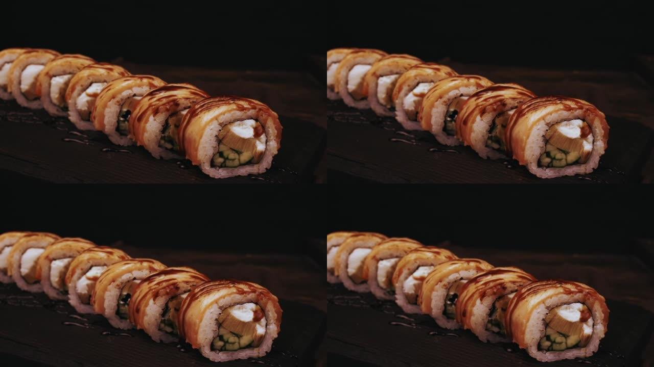 特写慢动作4k镜头新鲜寿司掉落倒酱油。