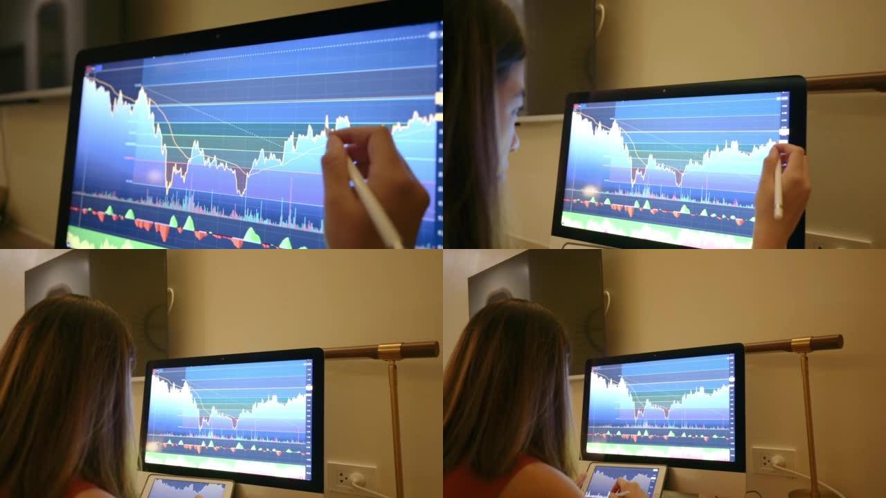 年轻的亚洲投资金融分析师在她的电脑上使用钢笔绘制趋势线加密在证券交易所市场工作
