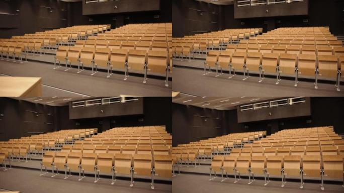现代演讲厅，木椅排成一排