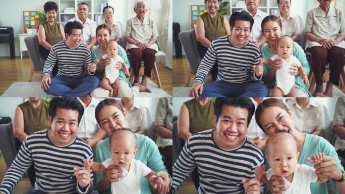 肖像快乐亚洲大家庭有祖父母在家微笑看镜头