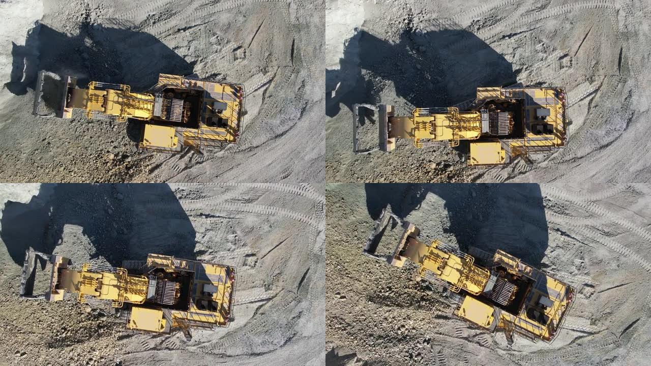 露天矿挖矿作业液压挖掘机，空中慢动作拍摄