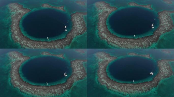 大蓝洞巨型海洋污水坑伯利兹内的高顶无人机景观游艇