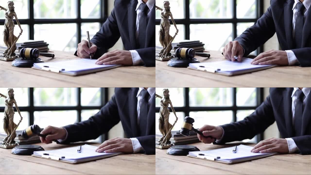 律师阅读合同文件中的条款，法律协议和签字