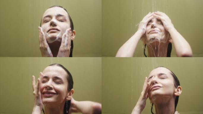 年轻女子淋浴时在脸上涂抹清洁泡沫