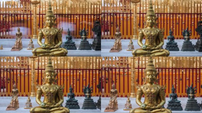 在泰国清迈的土素贴寺，佛教信徒们在主塔周围散步，前景是一个看起来宁静的佛像，放大